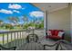 Relax on this balcony with stunning views of a pond, golf course, and beautiful landscaping at 1001 World Tour Blvd. # 203, Myrtle Beach, SC 29579