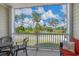 Balcony view of a serene pond and lush golf course on a sunny day at 1001 World Tour Blvd. # 203, Myrtle Beach, SC 29579