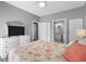 Spacious bedroom featuring a bed, TV, and easy access to a private bathroom and closet at 1001 World Tour Blvd. # 203, Myrtle Beach, SC 29579
