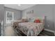 Bright bedroom featuring two cozy beds with sea themed linens, a dresser, and a window at 1001 World Tour Blvd. # 203, Myrtle Beach, SC 29579