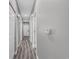 Neutral-toned hallway with multiple doors and sleek flooring, creating an inviting and functional space at 1001 World Tour Blvd. # 203, Myrtle Beach, SC 29579