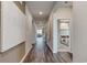 Bright hallway featuring beautiful floors that lead to the home's common areas and bedrooms at 1014 Laconic Dr., Myrtle Beach, SC 29588