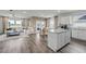 Open-concept living room with hardwood floors, neutral color palette, and plenty of natural light at 1014 Laconic Dr., Myrtle Beach, SC 29588