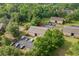 Aerial shot of an apartment complex with ample parking surrounded by lush greenery at 1015 Elm St. # 4, Conway, SC 29526