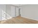 Spacious bedroom featuring neutral paint, light wood floors, and two closets at 1015 Elm St. # 4, Conway, SC 29526