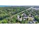 Aerial view of townhomes nestled amidst lush greenery, with convenient access to beaches at 10301 N Kings Hwy. # 10-4, Myrtle Beach, SC 29572