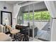 Inviting balcony offers seating, work area, and views of lush greenery at 10301 N Kings Hwy. # 10-4, Myrtle Beach, SC 29572