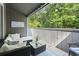 Relaxing covered deck features comfortable seating, stylish decor, and calming views at 10301 N Kings Hwy. # 10-4, Myrtle Beach, SC 29572