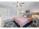 Relaxing bedroom featuring a ceiling fan, and neutral color palette at 10301 N Kings Hwy. # 10-4, Myrtle Beach, SC 29572