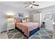 Lovely bedroom featuring two night stands and a view to the exterior at 10301 N Kings Hwy. # 10-4, Myrtle Beach, SC 29572