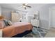 Comfortable bedroom featuring a ceiling fan, large window and light color palette at 10301 N Kings Hwy. # 10-4, Myrtle Beach, SC 29572