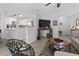 Bright living room seamlessly connecting to a modern kitchen, with stylish decor and ample space at 10301 N Kings Hwy. # 10-4, Myrtle Beach, SC 29572