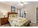 Bedroom with a large window and tropical bedding at 1105 Lampwick Ln., Murrells Inlet, SC 29576