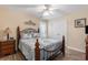 Bedroom featuring a full bed, a ceiling fan and lovely coastal themed decor at 1105 Lampwick Ln., Murrells Inlet, SC 29576