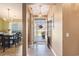 Inviting foyer featuring hardwood floors, decorative lighting, and access to the dining room at 1105 Lampwick Ln., Murrells Inlet, SC 29576