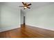 Bedroom with hardwood floors, ceiling fan, and spacious design at 115 Ford Ave, Mullins, SC 29574