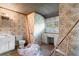 Under-renovation bathroom featuring vintage wallpaper, a vanity, and desk area by a window at 118 Ford Ave, Mullins, SC 29574