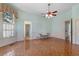 Spacious living room with parquet floors, lots of natural light, and neutral walls at 118 Ford Ave, Mullins, SC 29574