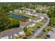Aerial view of condo community featuring ponds, green spaces, and assigned parking at 1356 Glenns Bay Rd. # 202H, Myrtle Beach, SC 29575