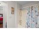 Bathroom with shower and tub combo and a decorative shower curtain at 1356 Glenns Bay Rd. # 202H, Myrtle Beach, SC 29575