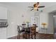 Cozy dining area featuring a modern table set, a ceiling fan, and stylish decor at 1356 Glenns Bay Rd. # 202H, Myrtle Beach, SC 29575