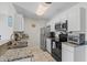 Well-lit kitchen featuring granite countertops, stainless steel appliances, and modern finishes at 1356 Glenns Bay Rd. # 202H, Myrtle Beach, SC 29575