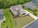 Aerial view of a beautifully landscaped home, showcasing its well-manicured lawn and inviting curb appeal at 1367 Bermuda Grass Dr., Myrtle Beach, SC 29579