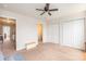 Cozy bedroom featuring carpeted floors and access to a private bathroom at 1367 Bermuda Grass Dr., Myrtle Beach, SC 29579