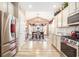 Open kitchen and dining area featuring stainless steel appliances and bright lighting at 1367 Bermuda Grass Dr., Myrtle Beach, SC 29579