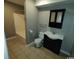 Bathroom with tiled floors, standard toilet and vanity, and a shower/tub combo at 1432 Highway 544 # B2, Conway, SC 29526