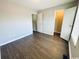 Bright bedroom with wood floors, closet, and view at 1432 Highway 544 # B2, Conway, SC 29526
