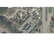 Aerial view of a well-maintained community with ample parking and green spaces conveniently located near the main road at 1432 Highway 544 # B7, Conway, SC 29526