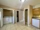 Functional laundry area with a washing machine, storage shelves, and extra cabinet space at 1432 Highway 544 # B7, Conway, SC 29526
