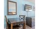 Table and chairs in a cozy room with mirror and dresser at 1501 S Ocean Blvd. # 501, Myrtle Beach, SC 29577