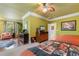 Bedroom with two beds, ceiling fan, decorative lamps, and access to additional seating area at 1516 James Island Ave., North Myrtle Beach, SC 29582