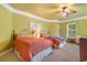 Cozy bedroom with two beds, a ceiling fan, and a window with natural light at 1516 James Island Ave., North Myrtle Beach, SC 29582