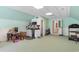 A spacious bonus room offers versatile space with a wet bar and easy access to other rooms at 1516 James Island Ave., North Myrtle Beach, SC 29582