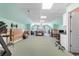 This bonus room features carpeted floors, a ceiling fan, and lots of space at 1516 James Island Ave., North Myrtle Beach, SC 29582
