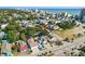 Aerial shot of a charming neighborhood close to the beach with a swimming pool and palm tree lined streets at 1622 Havens Dr., North Myrtle Beach, SC 29582