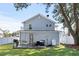 Charming home backyard with deck, grill, and string lights, ideal for outdoor gatherings at 1622 Havens Dr., North Myrtle Beach, SC 29582