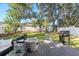 Relaxing backyard featuring a fire pit, barbecue, and deck, creating an ideal outdoor retreat at 1622 Havens Dr., North Myrtle Beach, SC 29582
