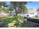 Spacious backyard with patio, outdoor furniture, grill, and privacy fence, perfect for entertaining at 1622 Havens Dr., North Myrtle Beach, SC 29582