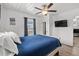 Serene bedroom featuring a queen bed, soft decor, and a television for relaxing evenings at 1622 Havens Dr., North Myrtle Beach, SC 29582