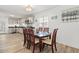 Dining area adjacent to the kitchen, featuring a table for six and stylish decor at 1622 Havens Dr., North Myrtle Beach, SC 29582