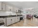 Kitchen with stainless appliances and granite counters that seamlessly flows into dining and living spaces at 1622 Havens Dr., North Myrtle Beach, SC 29582