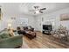 Inviting living room featuring a comfortable sofa and seating, with wood-look flooring throughout the space at 1622 Havens Dr., North Myrtle Beach, SC 29582