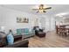 Inviting living room with comfortable seating, a ceiling fan, and seamless access to the dining area at 1622 Havens Dr., North Myrtle Beach, SC 29582
