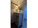 Hallway featuring dresser, cabinet and plant decoration, illuminated by stylish lamp at 1659 Sw Beach Dr., Sunset Beach, NC 28468