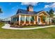 Charming clubhouse with colorful siding, shutters, and a welcoming entrance at 1903 Francis Ct., Myrtle Beach, SC 29577