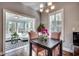 Cozy dining area adjacent to a sunroom at 1903 Francis Ct., Myrtle Beach, SC 29577
